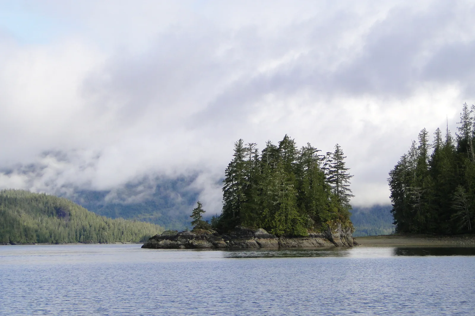 Boats and forested islands in Clayoquot Sound near Tofino