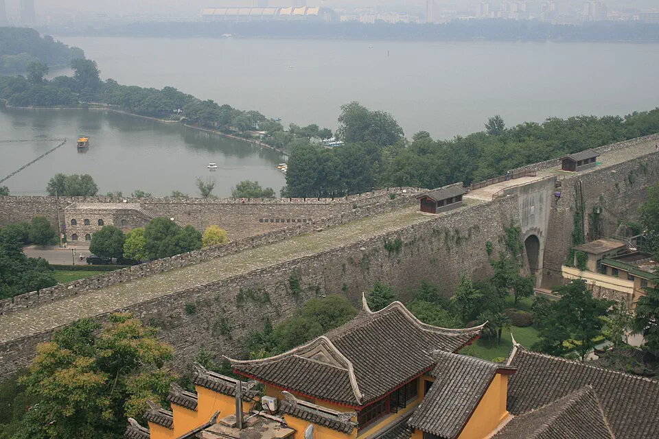 Nanjing City Wall above Xuanwu Lake and tiled temple roofs