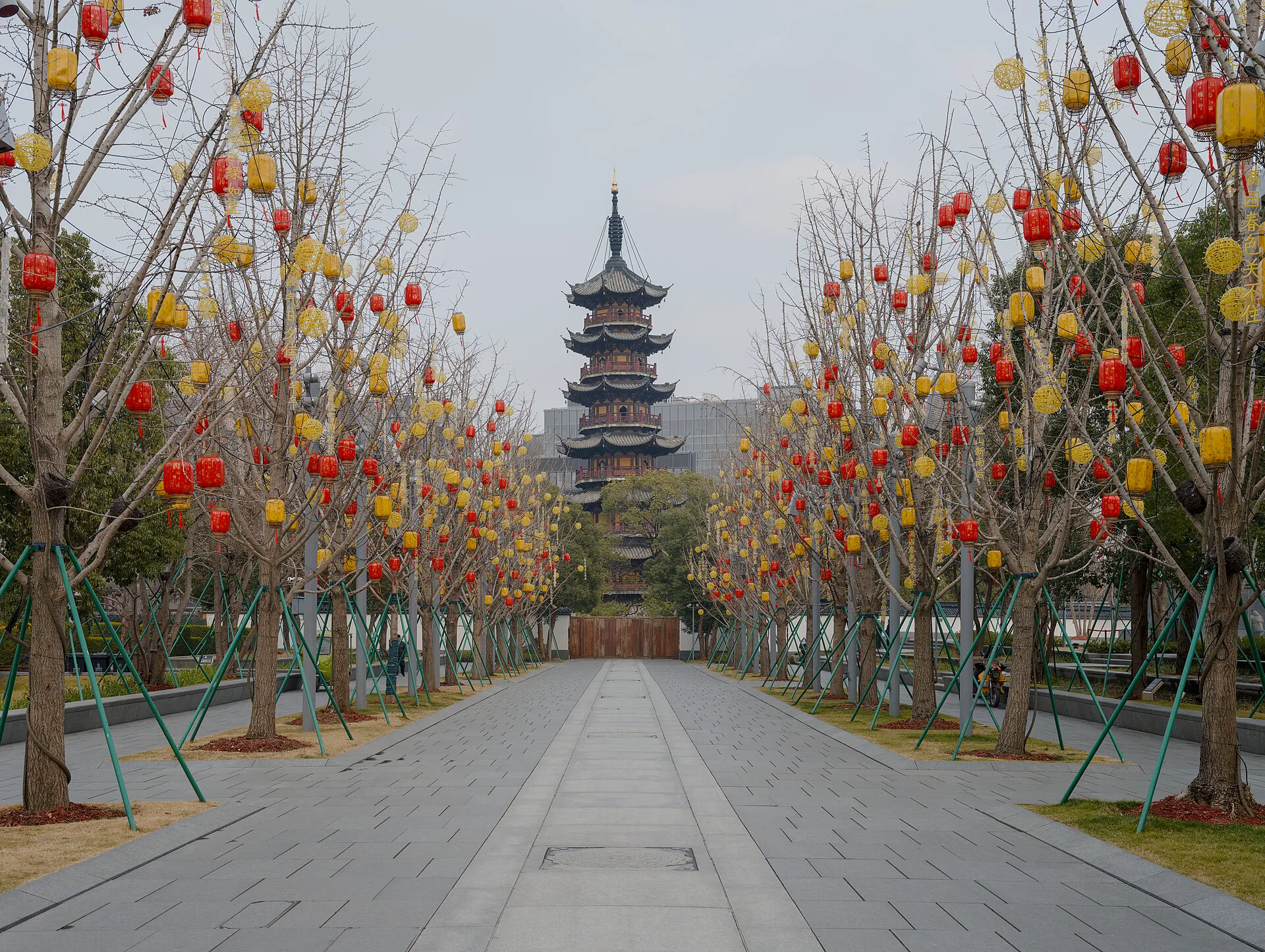 Longhua Pagoda framed by a lantern-lined approach