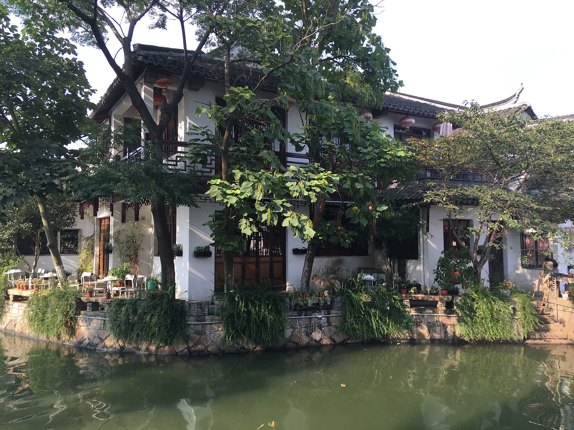 Traditional waterside houses and boats along a canal in Zhujiajiao