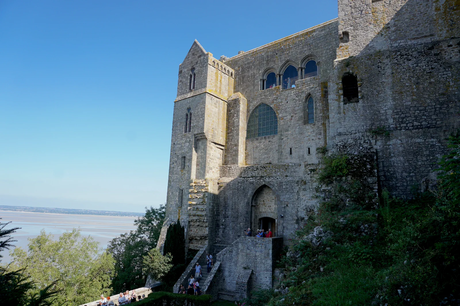 Mont-Saint-Michel rising above its tidal bay and approach
