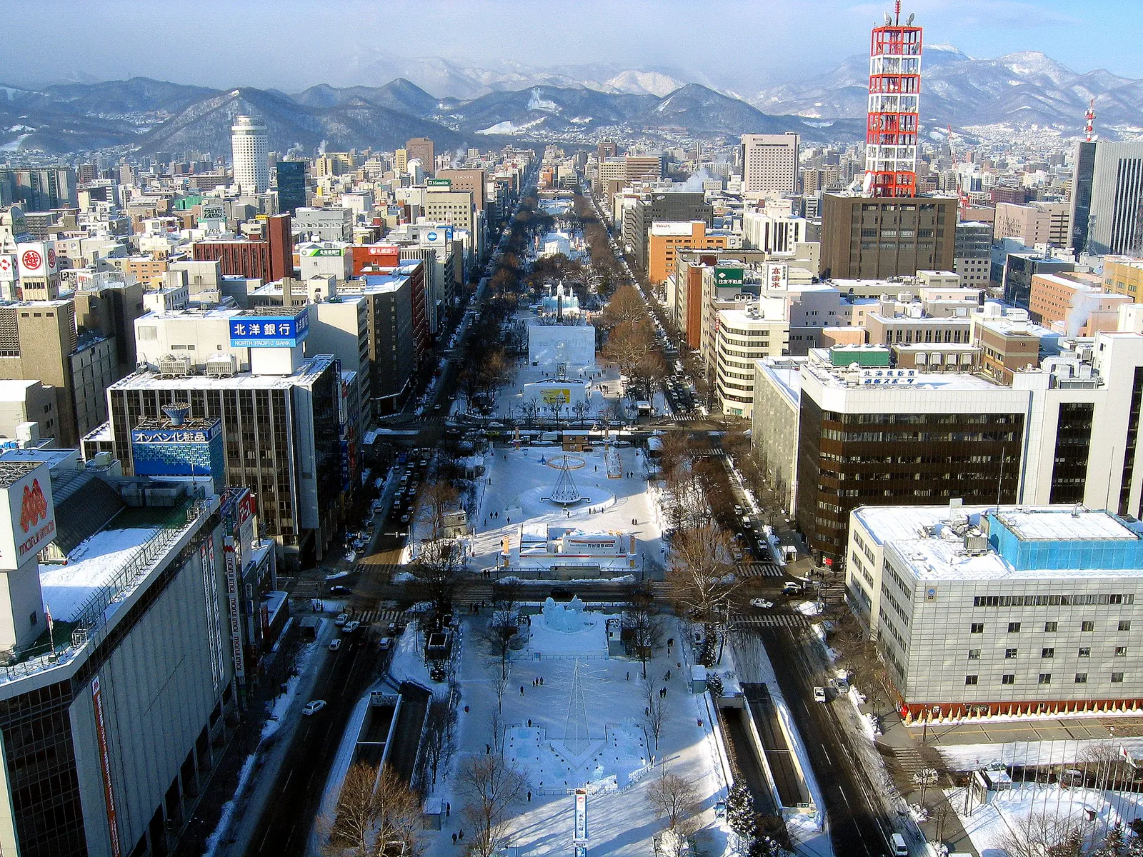 Snow-covered central Sapporo seen along Odori Park