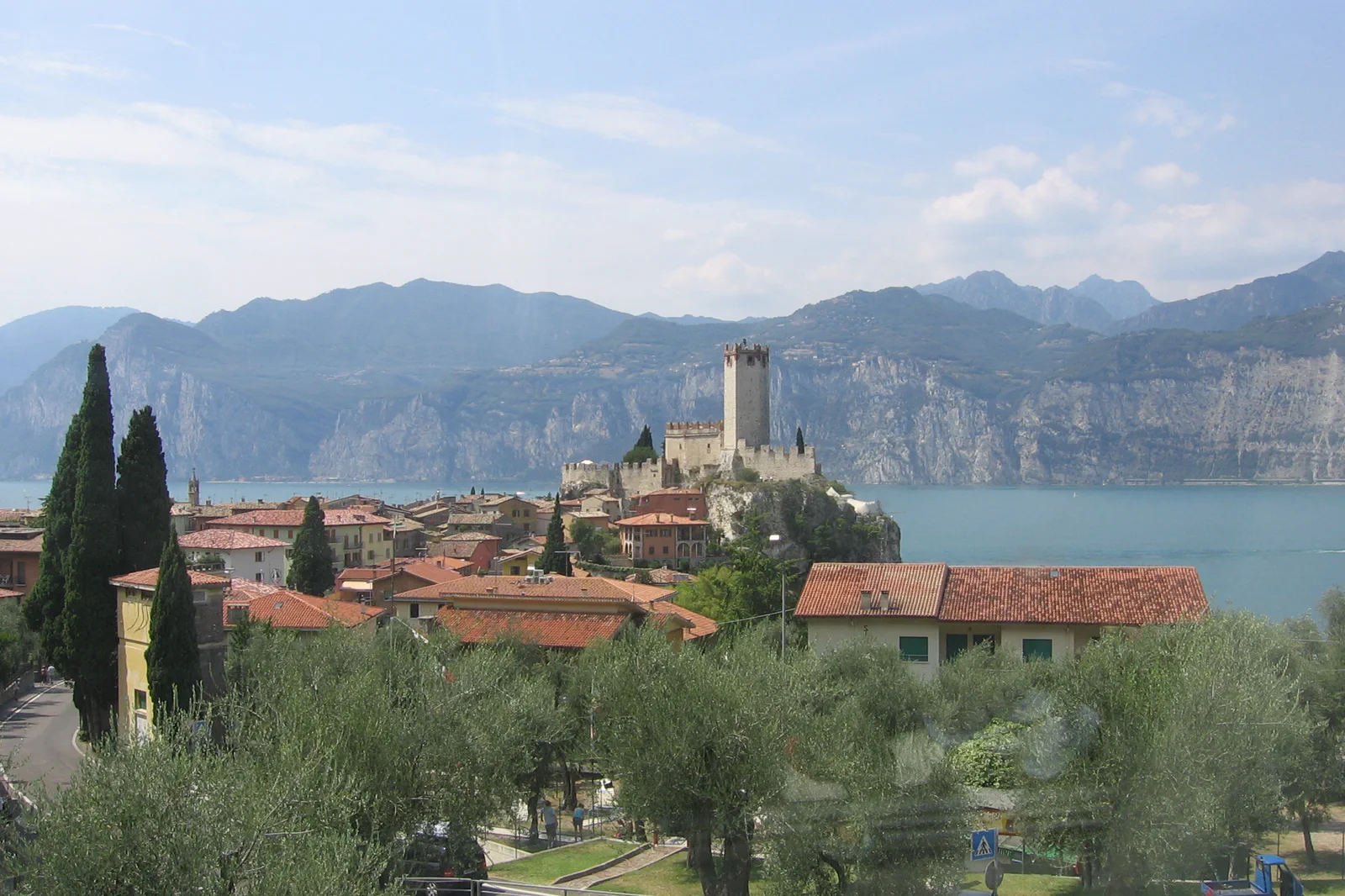Malcesine waterfront, castle and mountains on Lake Garda
