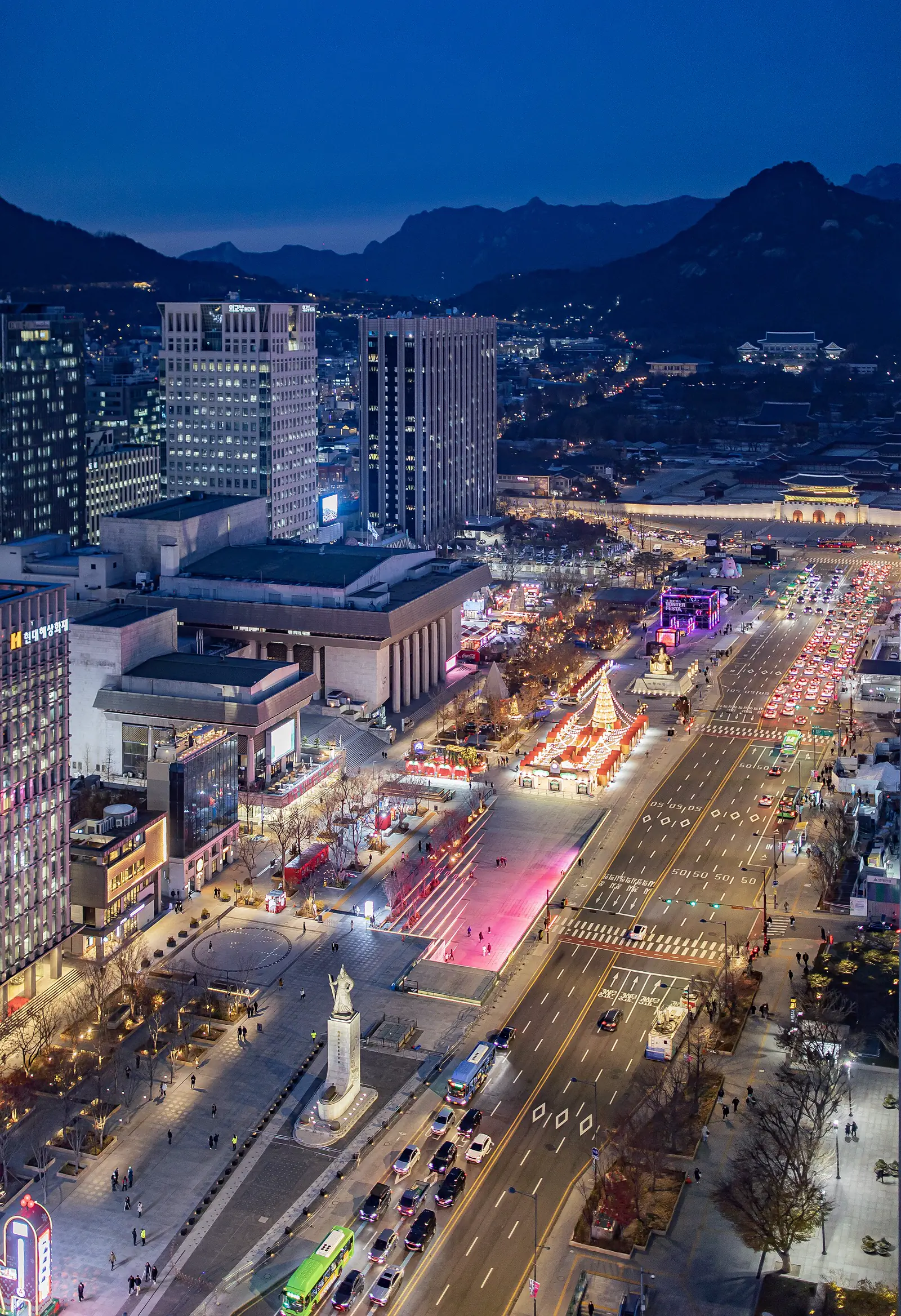Gwanghwamun Square and its palace gate illuminated at night