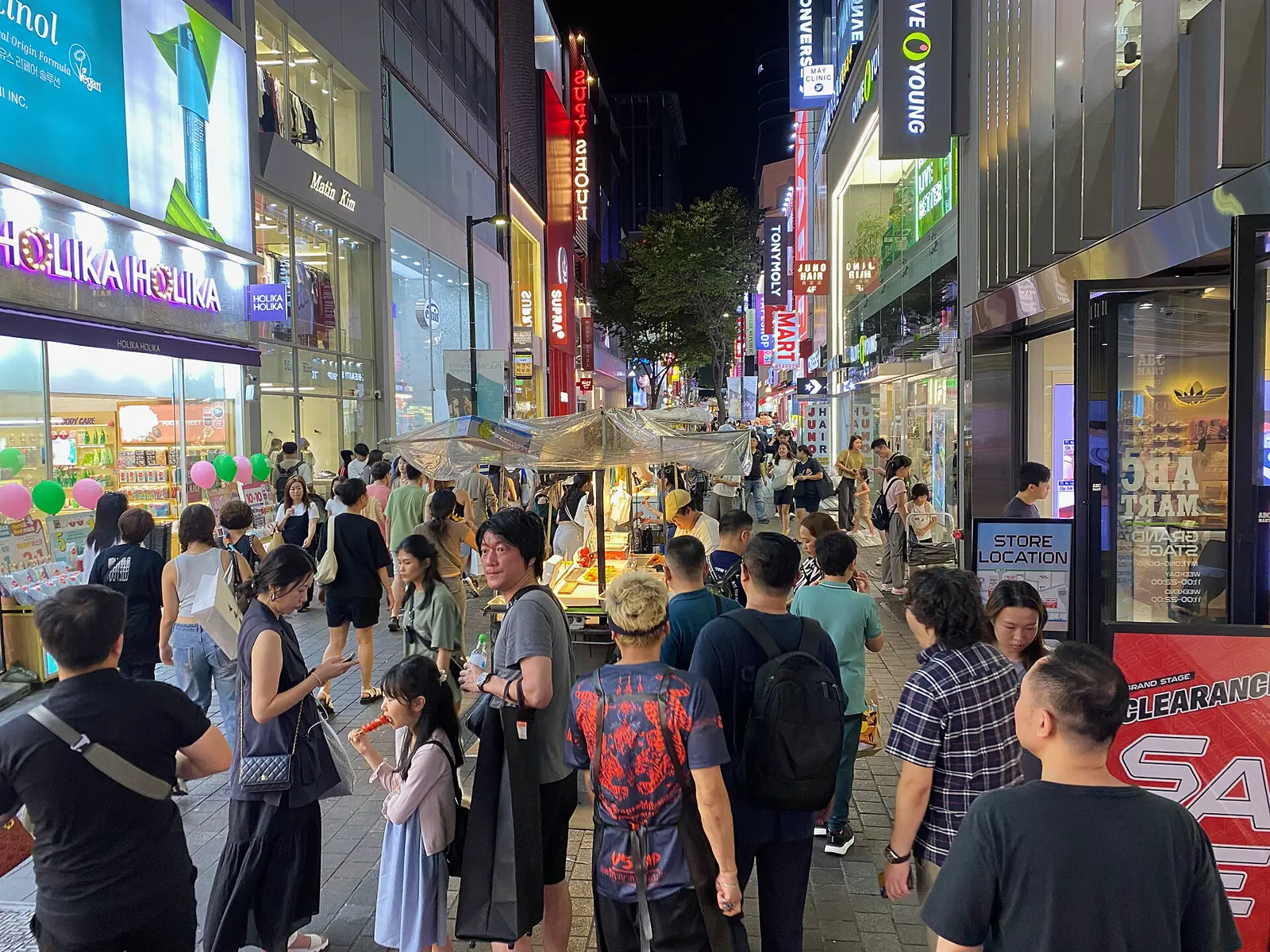 Busy Myeongdong night market street