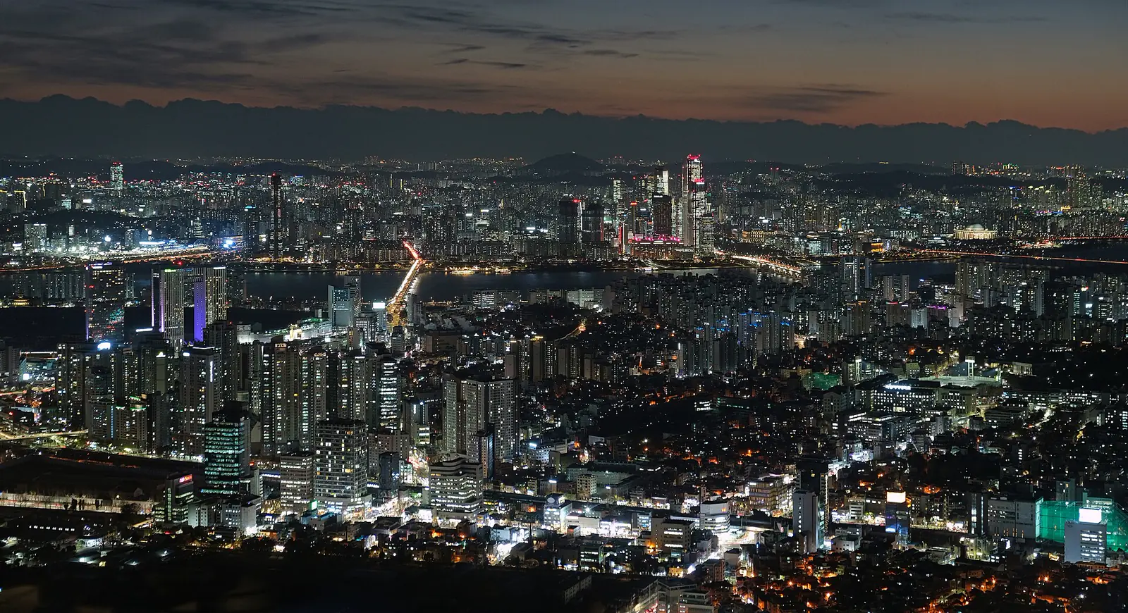 N Seoul Tower rising above the city at dusk