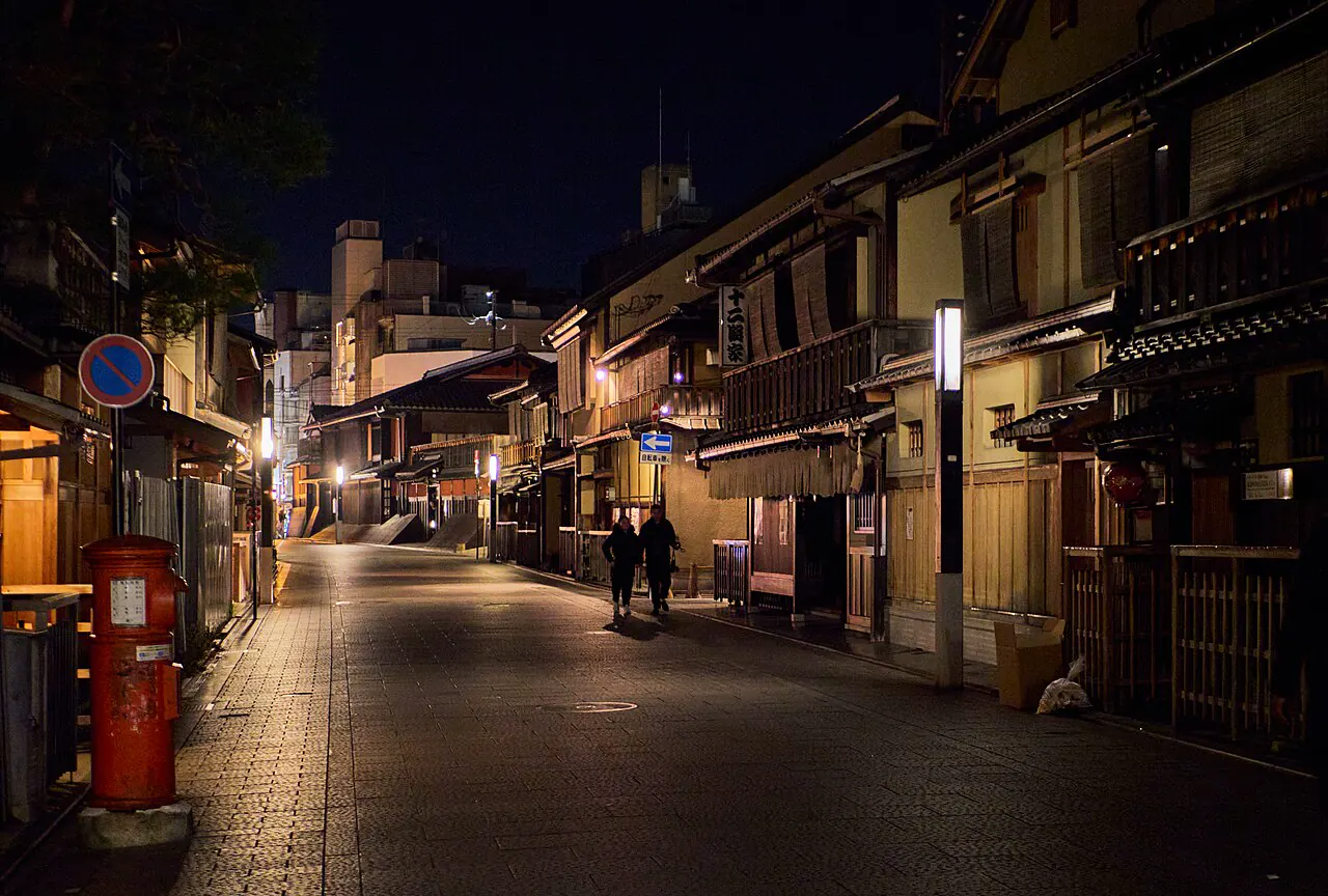 Traditional wooden streets of Gion illuminated at night