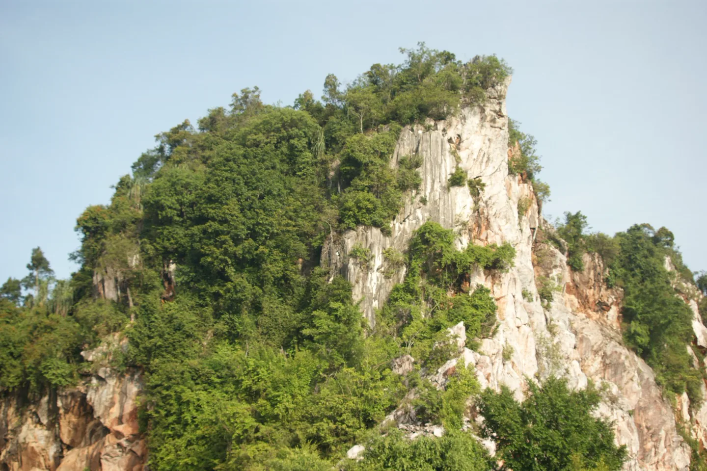 Steep limestone hill rising above the Kinta Valley