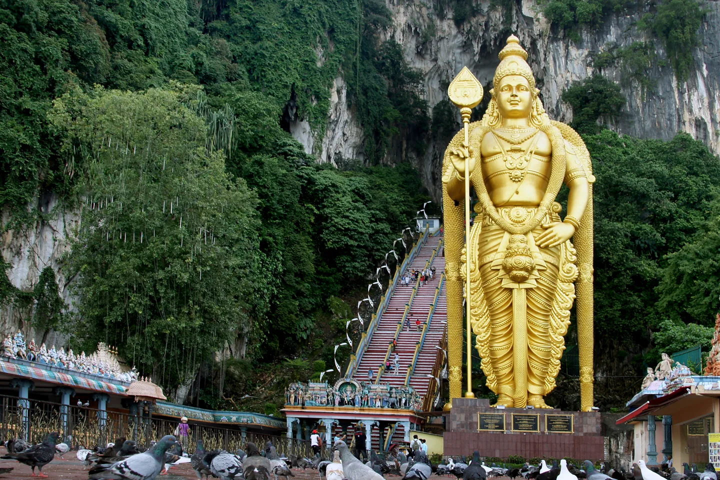 Colorful staircase and limestone entrance at Batu Caves