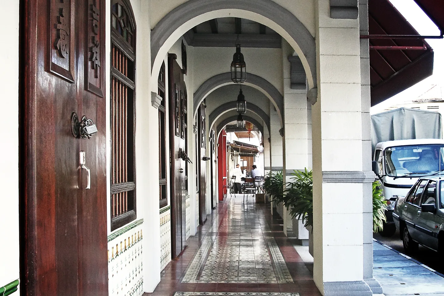 A shaded five-foot way beneath George Town shophouses