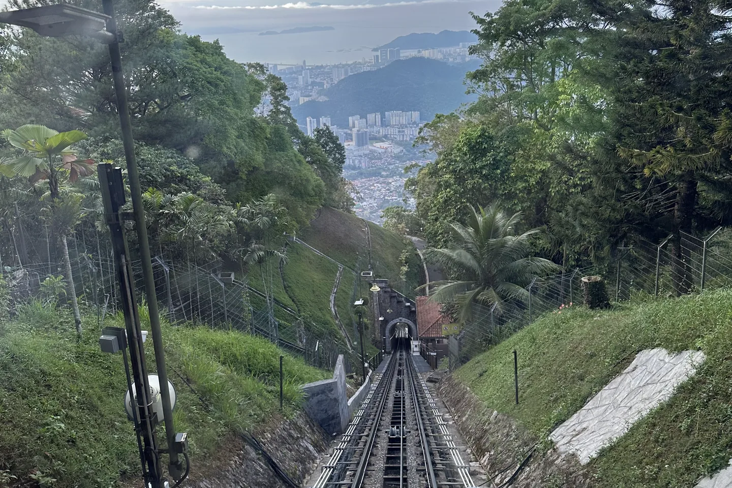 Funicular railway climbing through forest on Penang Hill