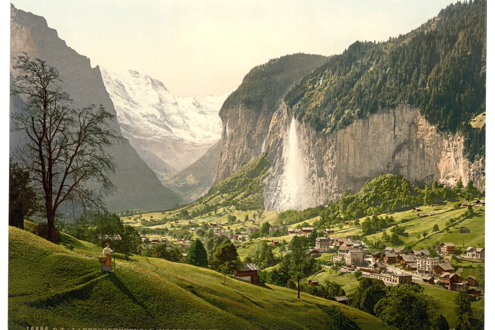 Lauterbrunnen valley with waterfalls and high cliffs