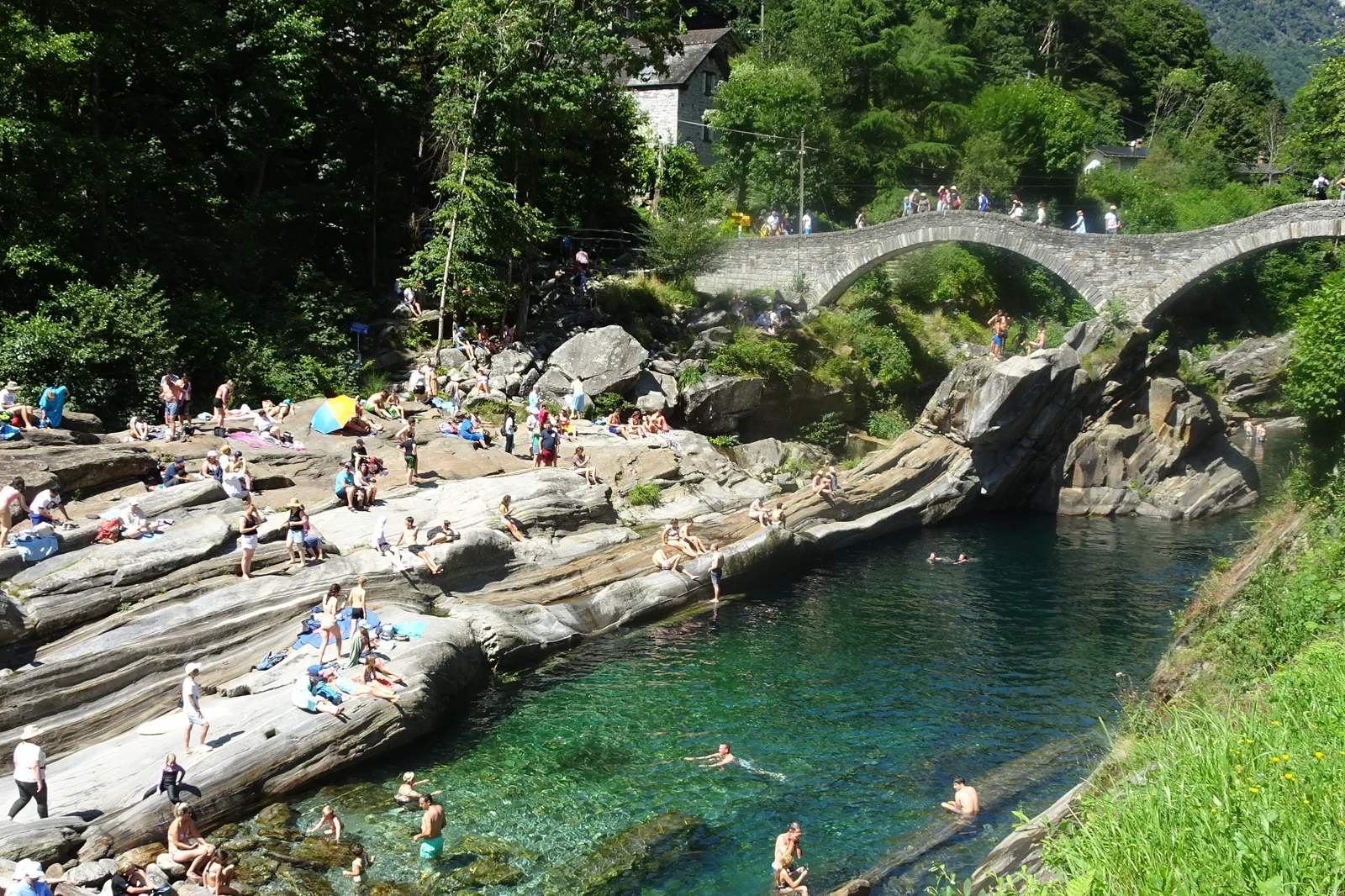 Stone bridge and turquoise river in the Verzasca Valley