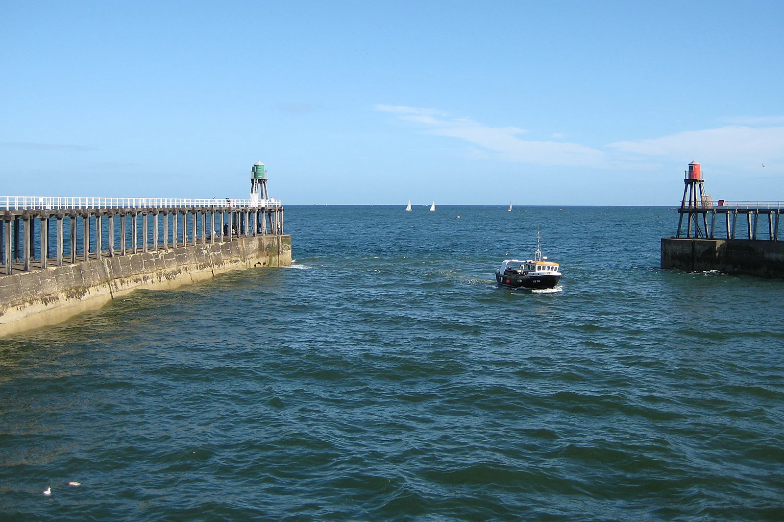 Whitby harbour beneath the abbey ruins on the Yorkshire coast
