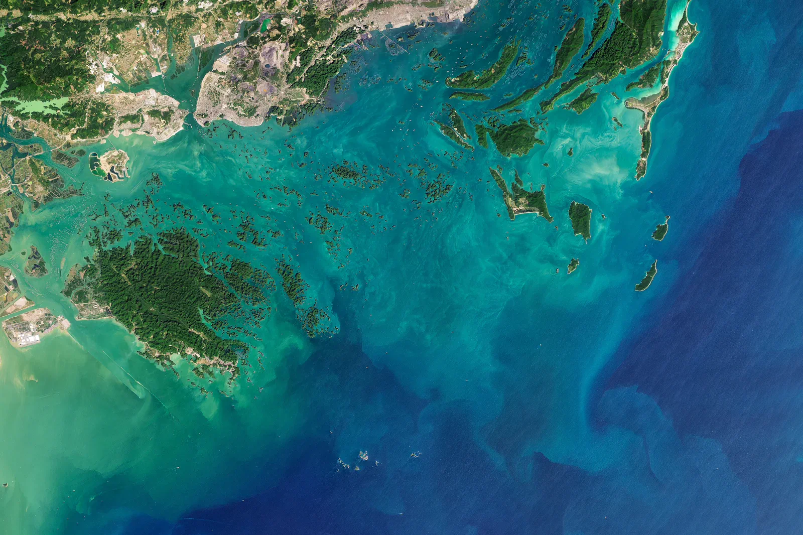 Satellite view of the islands and waters of Bai Tu Long Bay