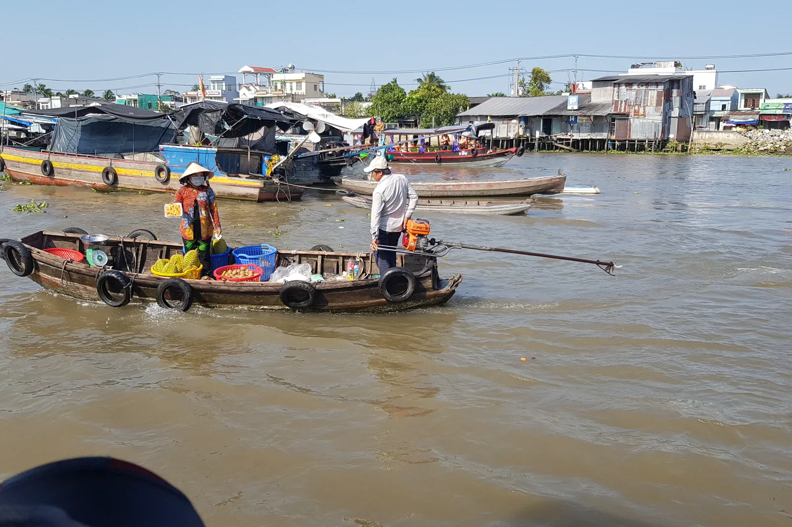 Boats trading fruit at Cai Rang Floating Market in Can Tho