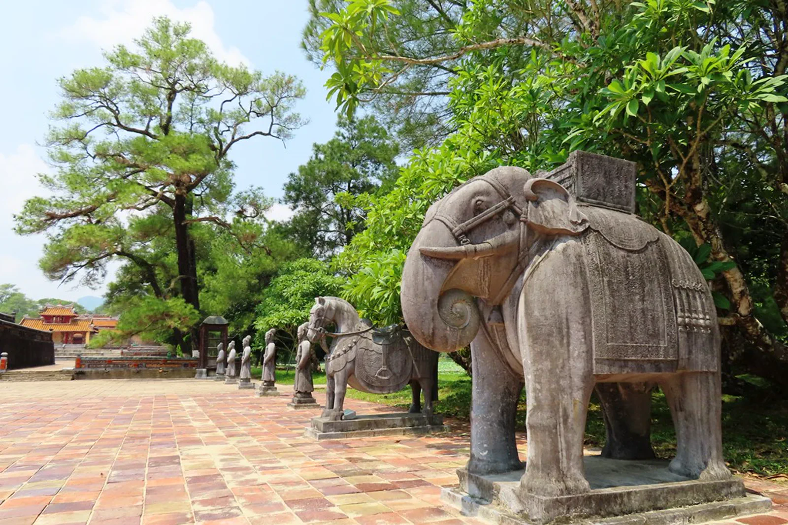 Stone animals and garden landscape at Minh Mang Tomb in Hue