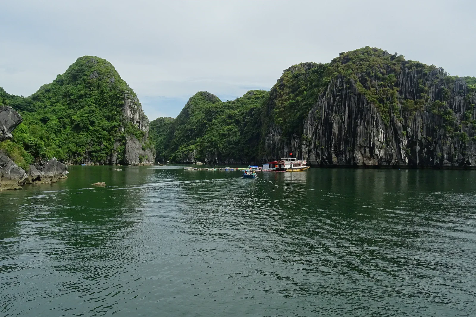 Limestone islands seen from a boat in Lan Ha Bay
