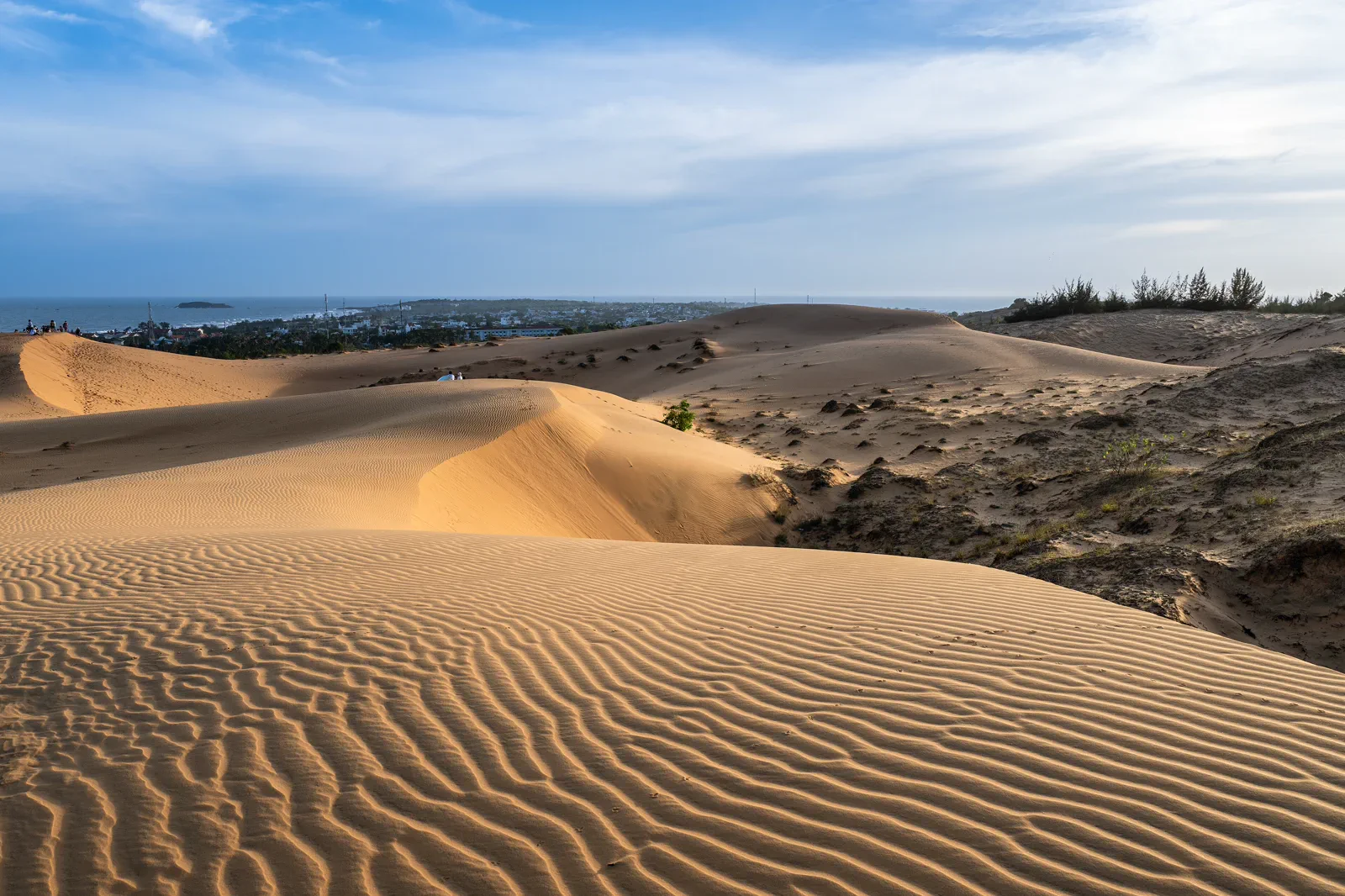 Wind-shaped red sand dunes outside Mui Ne