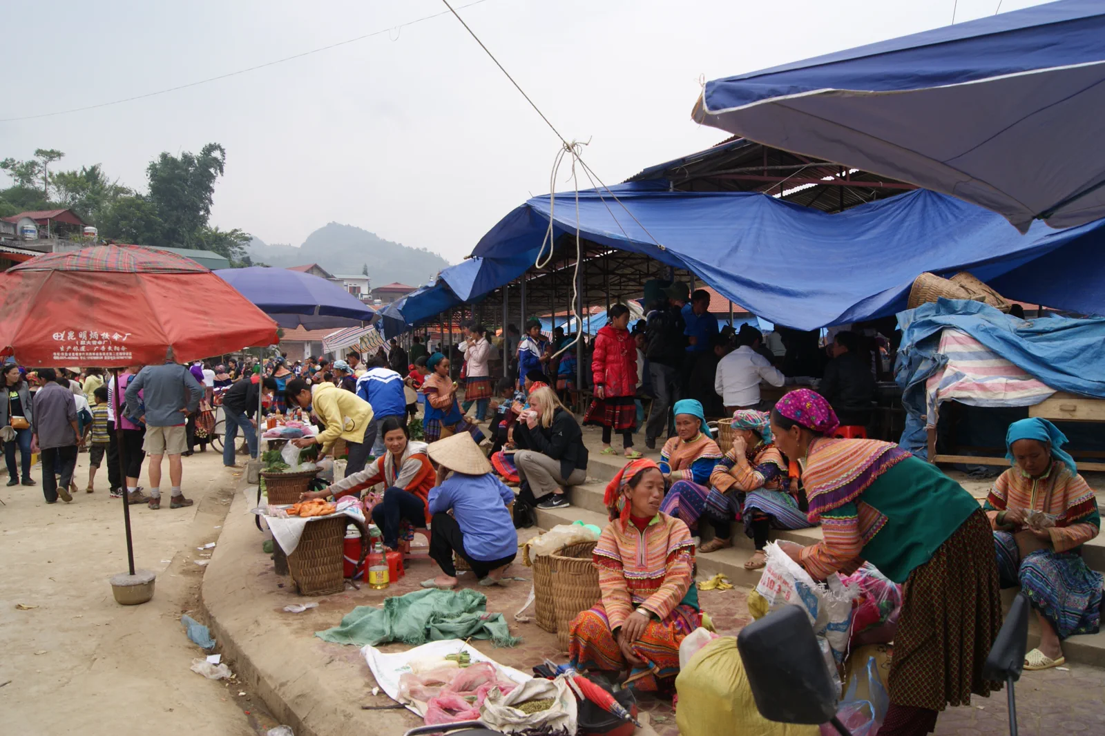 Vendors and shoppers at the colorful Bac Ha Sunday Market